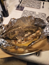 Unwrapping the cooked fish